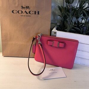 Coach Pink Darcy Bow Wristlet NWOT